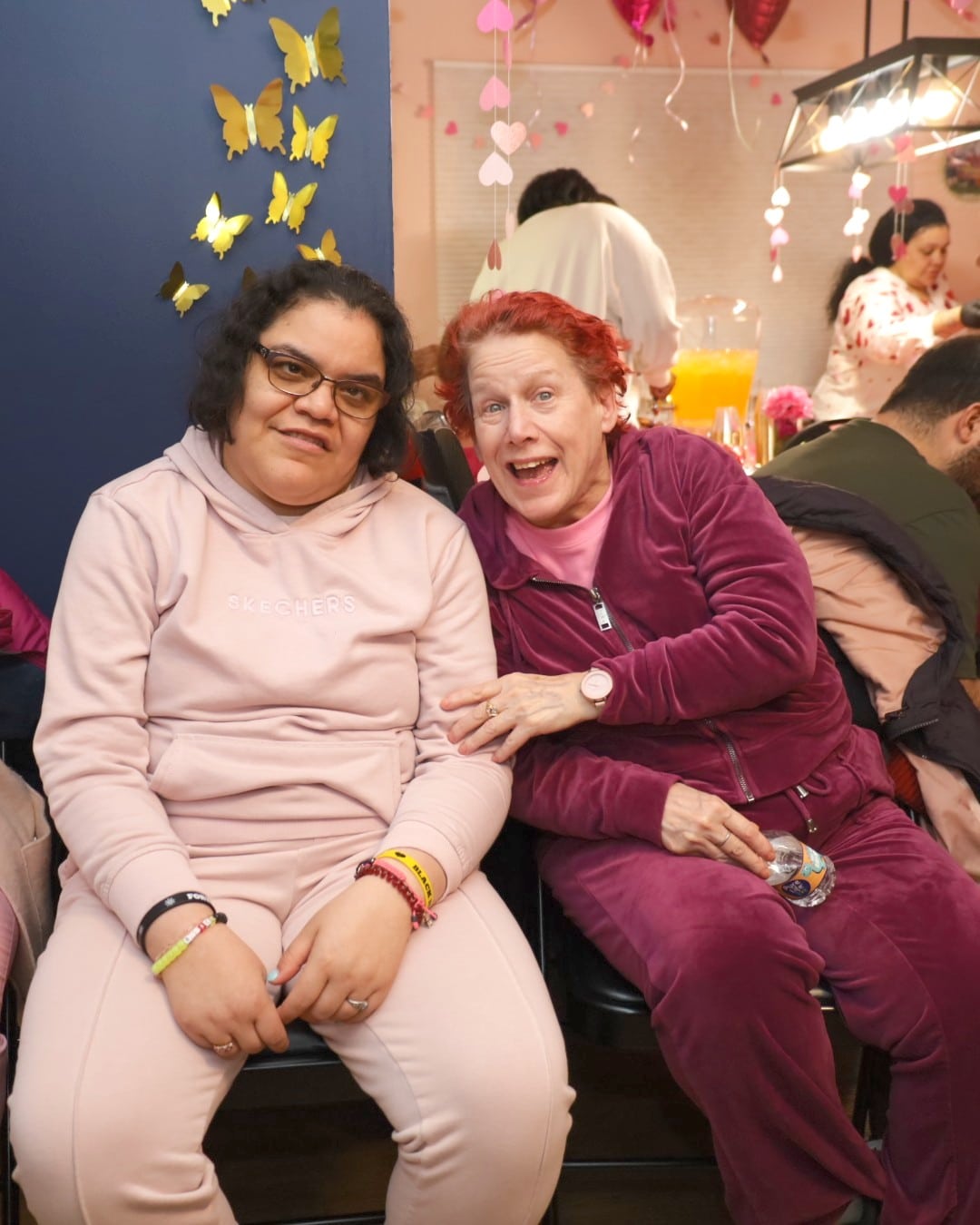 Two people supported by AHRC Nassau Residential Services