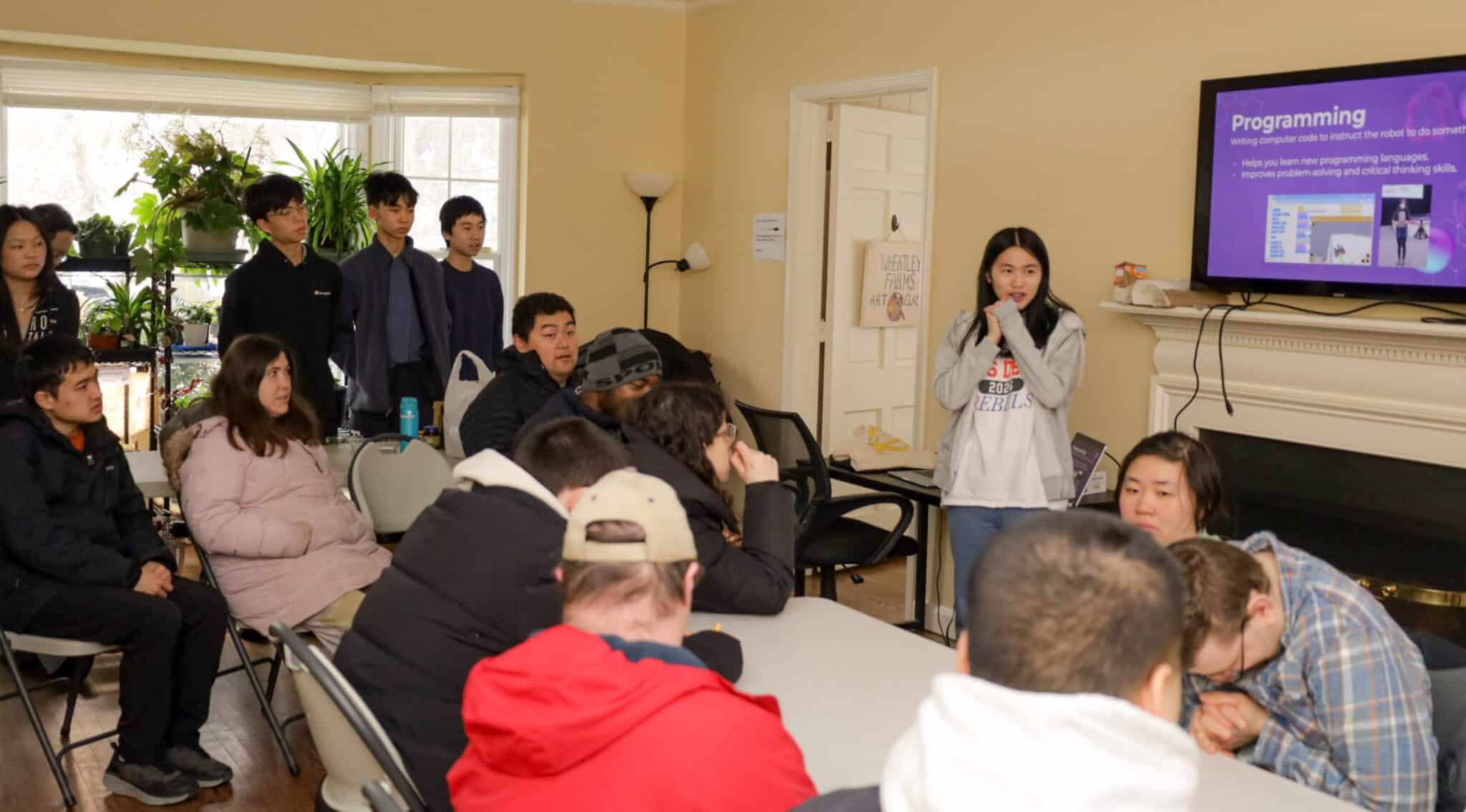 People supported by AHRC NAssau learning about STEAM at Wheatley Farms & Arts Center