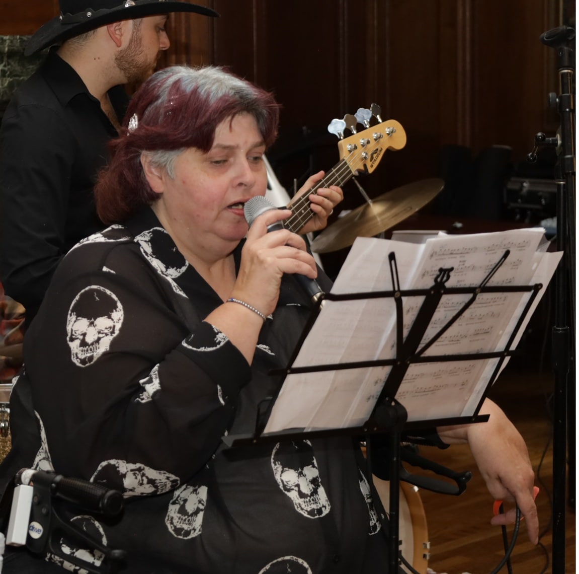 Coleen Mackin sings at her Halloween event