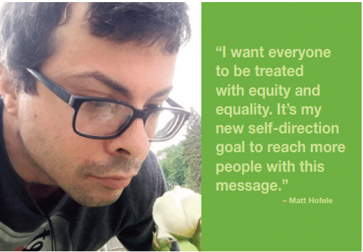 Matt Hofele looks at flower and shares "I want everyone to be treated with equity and equality. It's my new self-direction goal to reach more people with this message."