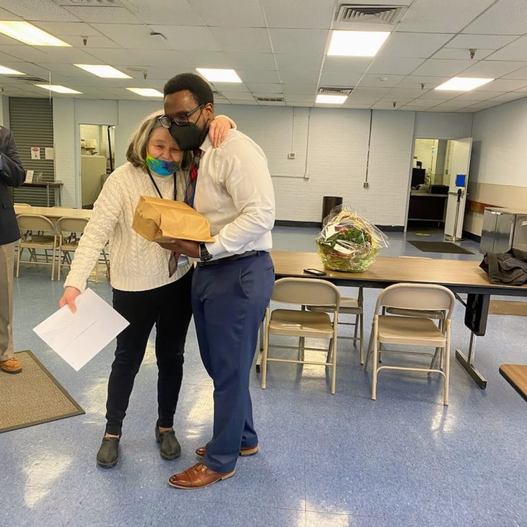 Margaret Baylis and Employment Services Director Justin Dantzler (right)