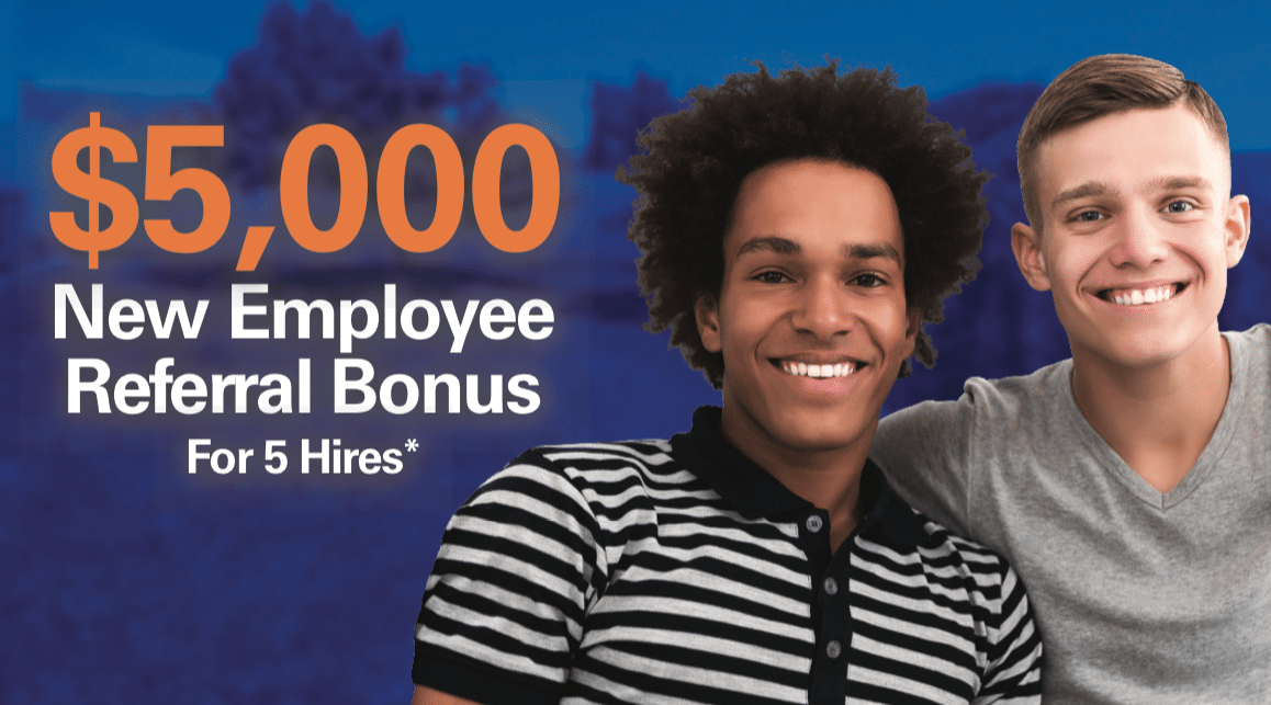 Two employees sit side by side, smiling. Orange and white text overlays image which reads $5,000 New Employee Referral Bonus.