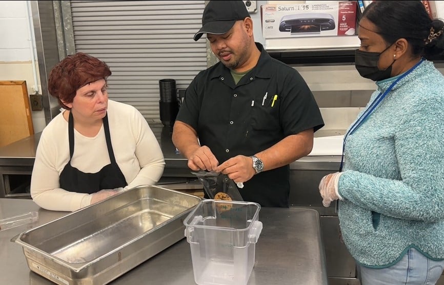 People supported work in the kitchen for Wheatley Farms catering