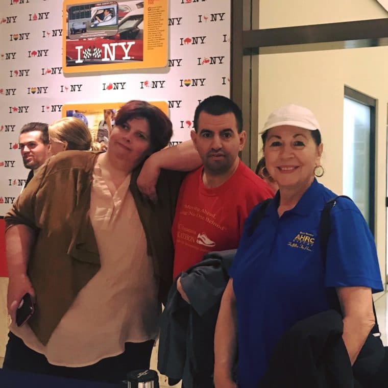 A group of self-advocates take a moment away from the rally to enjoy each other's company