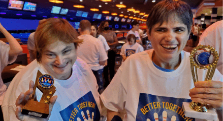 Friends enjoy bowling together