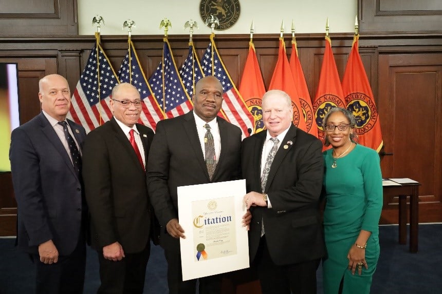 CEO Stanfort J. Perry with his award alongside other executives recognized