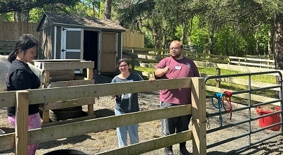 Jericho High School students working together with AHRC Nassau's Day-Habilitation at Wheatley Farms