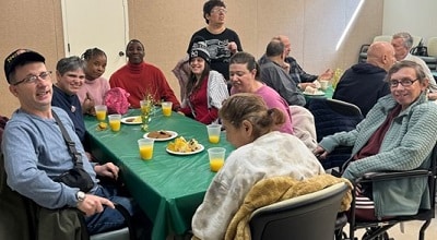 Farmingdale Day Services volunteers enjoy a luncheon at Farmingdale Library