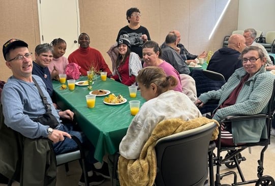 Farmingdale Day Services volunteers enjoy a luncheon at Farmingdale Library