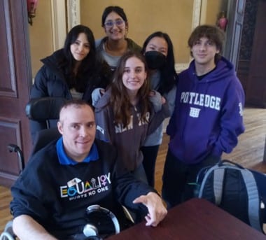 Portledge school staff and students pose for a photo during their day of inclusive volunteering