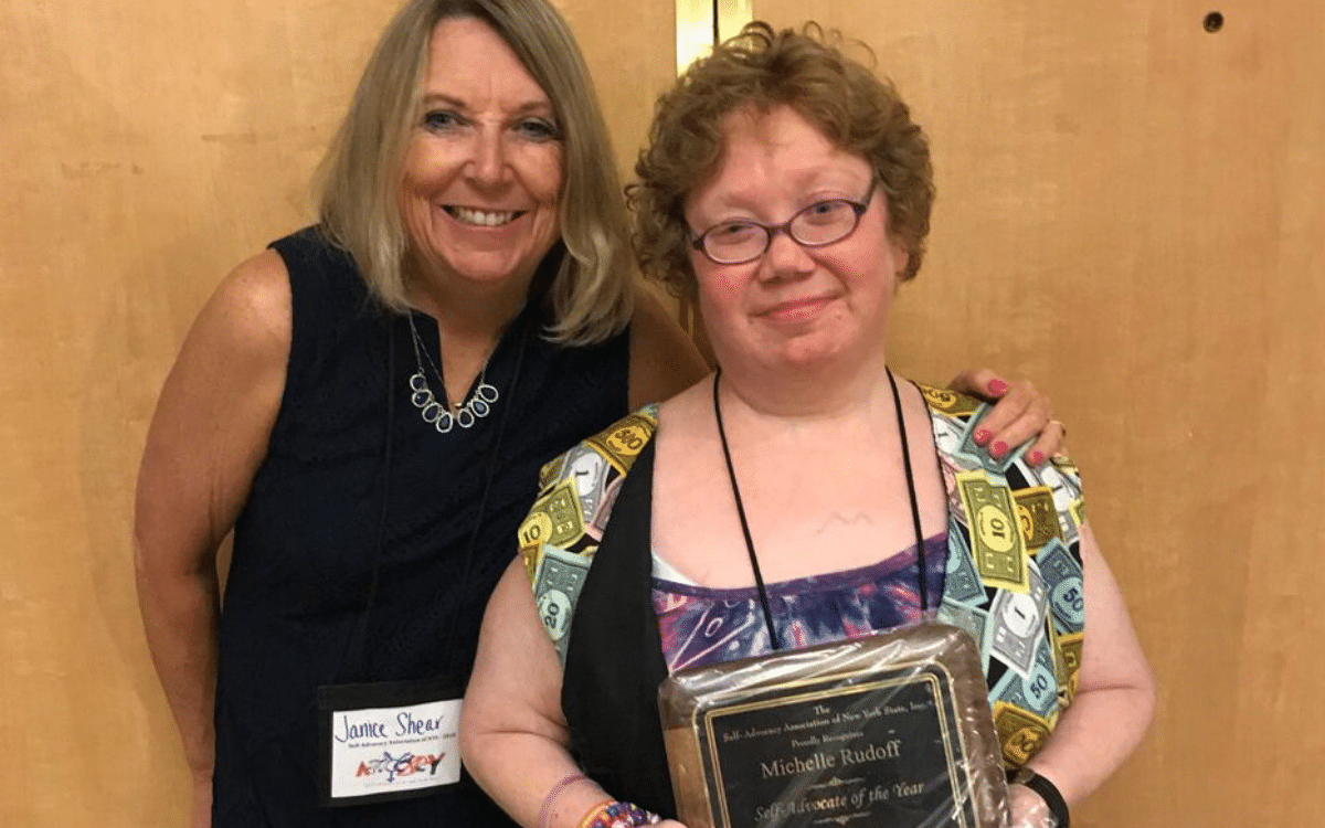 Michelle Rudoff and Janice Shear accept awards in Albany from the Self Advocacy Association in New York State.