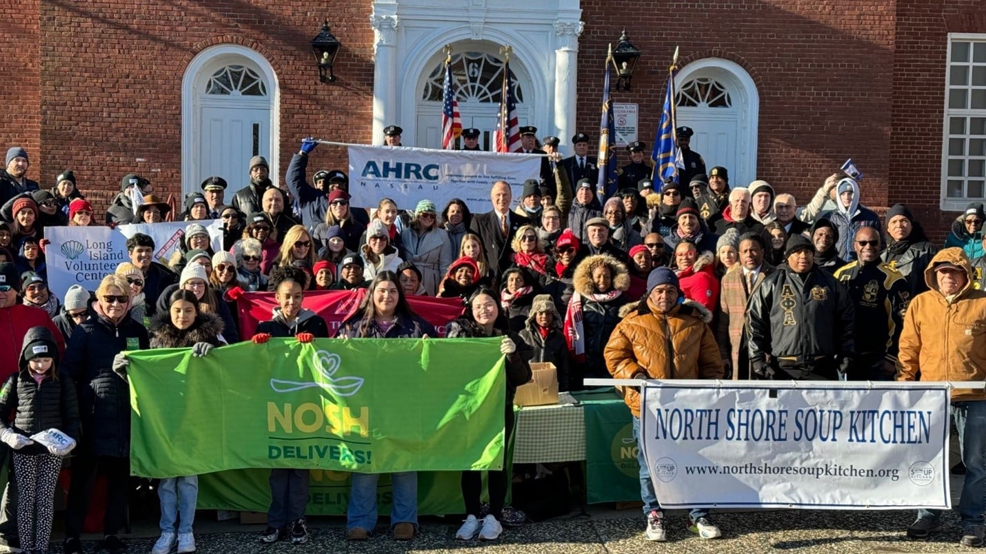 AHRC staff and community members march together for the MLK Day of Service