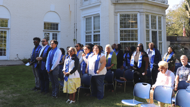 NADSP Graduates stand at their graduation ceremony.