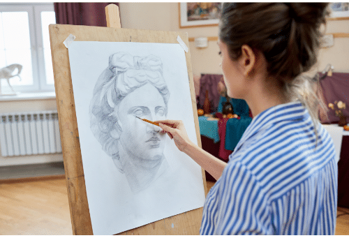 Woman painting a portrait