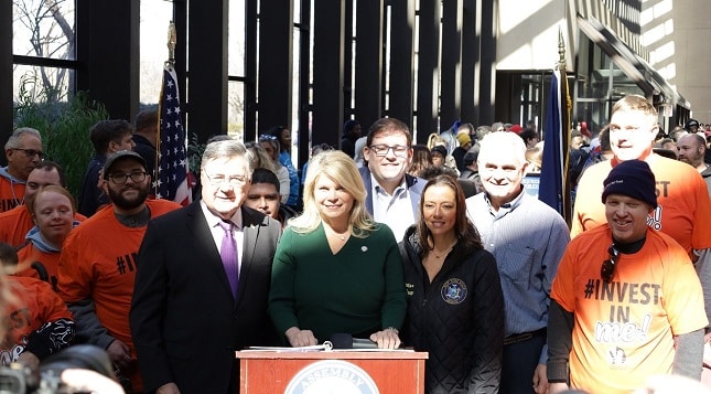 Self-advocates and elected officials at the rally