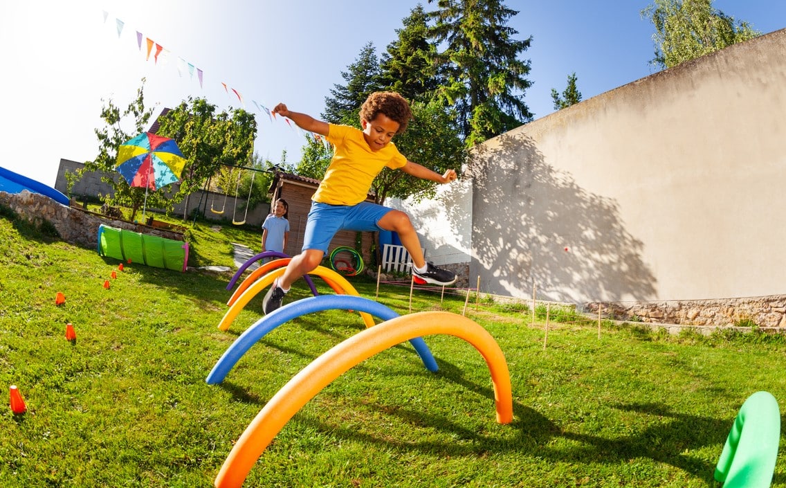 Child doing an obstacle course