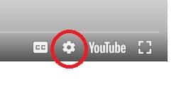 YouTube interface showing a gear icon for settings, highlighted in red.