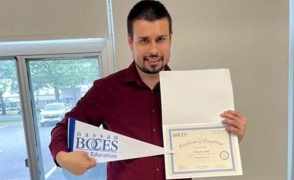 Timothy Lettal with his Certificate of Completion